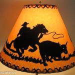 14" Rustic COwboy scene-Faux oiled kraft lamp shade with lacing top and bottom.