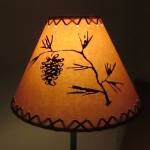 18" Rustic Pinecone scene-Faux oiled kraft lamp shade with lacing top and bottom.