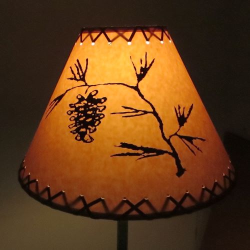 18" Rustic Pinecone scene-Faux oiled kraft lamp shade with lacing top and bottom.