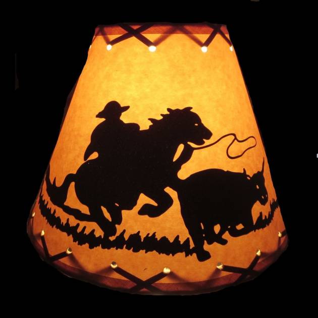 9" Rustic Cowboy scene-Faux oiled kraft laced lamp shade with lacing top and bottom and comes with clip-on.